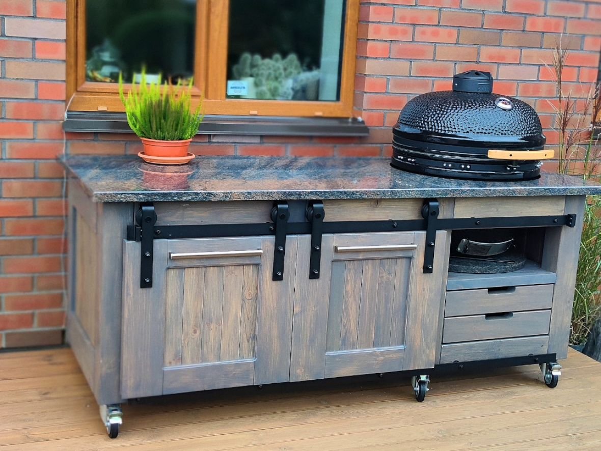 Granite stone table top with an opening for „Kamado“ barbecue